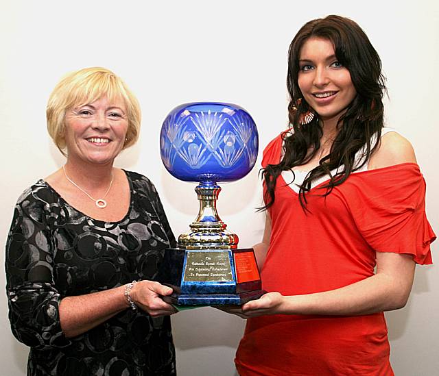 Kathryn Doherty receiving her winner’s award from Liz Barrett