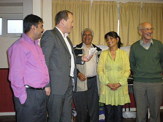 Simon Danczuk hands over the money raised alongside Councillor Imtiaz Ahmed, Ghulam Shahzad, Cilla Baynes and John Beasley