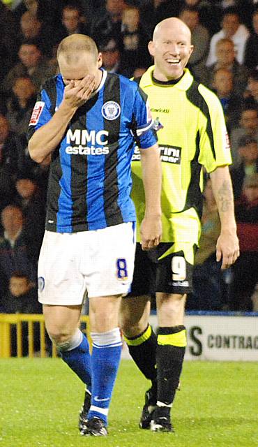 Gary Jones and Lee Hughes share a joke