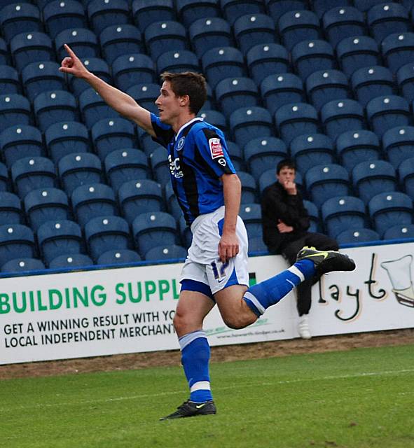 Jon Shaw celebrates his first goal for Rochdale