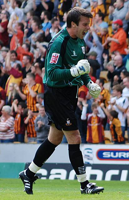 Evans celebrates Michael Boulding's opener for Bradford