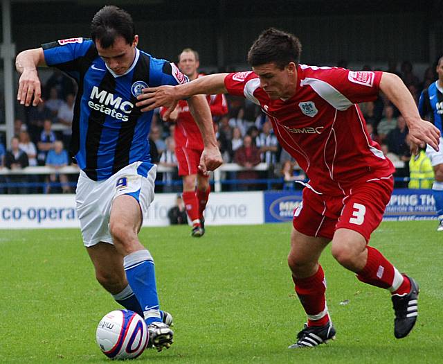 Chris Dagnall tries to get the better of Buchanan