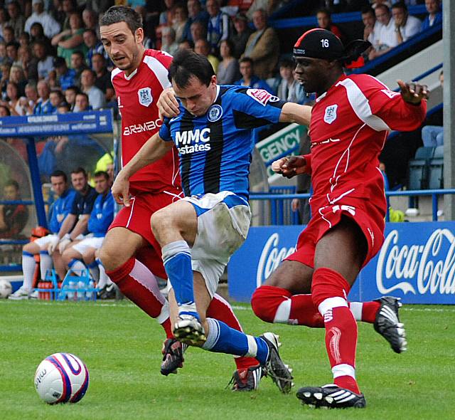 Brian Barry Murphy (left) in action against Rochdale for Bury