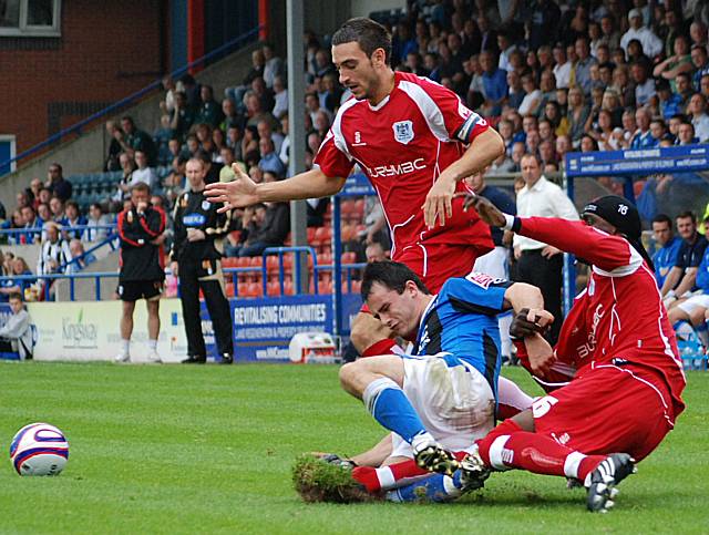 Sodje gets in a tackle on Dagnall