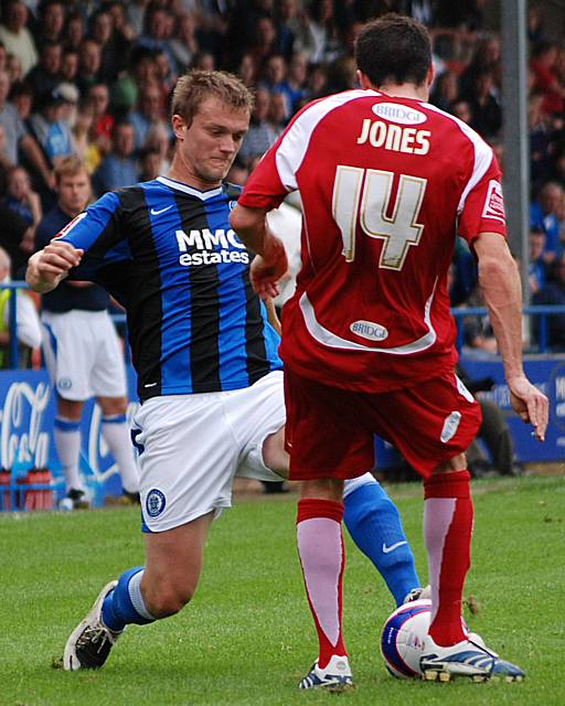 Scott Wiseman gets in a tackle on Michael Jones