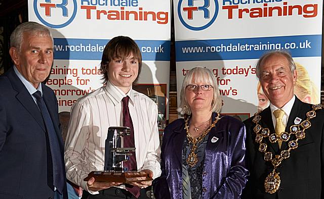 Mayor Robin Parker and Mayoress Ann Jones with Joe Stoloff of Farrel Ltd, this year’s first year engineering apprentice of the year, and Ernest Curzon, workshop manager at Rochdale Training. 