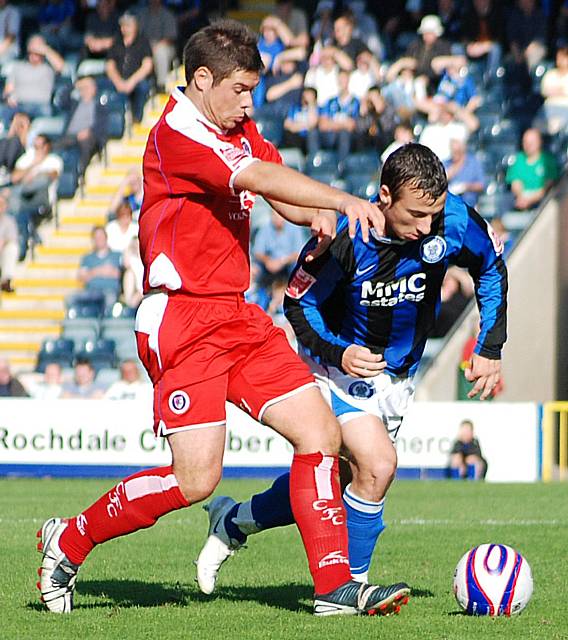 Adam Le Fondre tries to evade his marker.