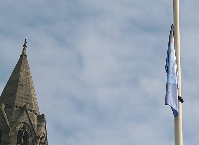 The flag for peace flies at the Town Hall.