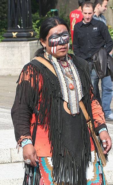 One of the performers in traditional costume.