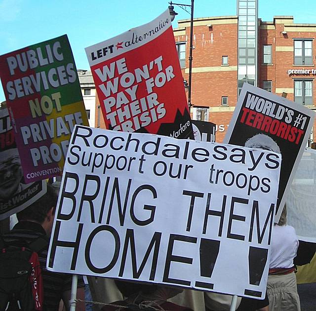 The Rochdale and Littleborough Peace Group banner carried by Joe Rathbone and his father in Oxford Road.