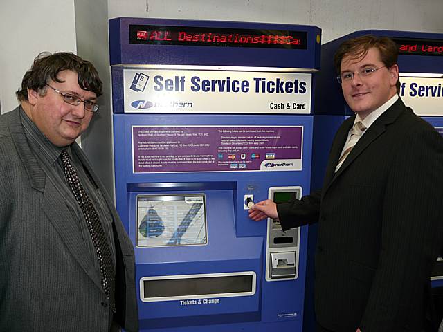 Councillors Colledge and Whitmore (Greater Manchester Passenger Transport Authority's Chairman and Vice Chairman) with a Northern Rail ticket machine at Piccadilly station. The same model will be used on Metrolink.