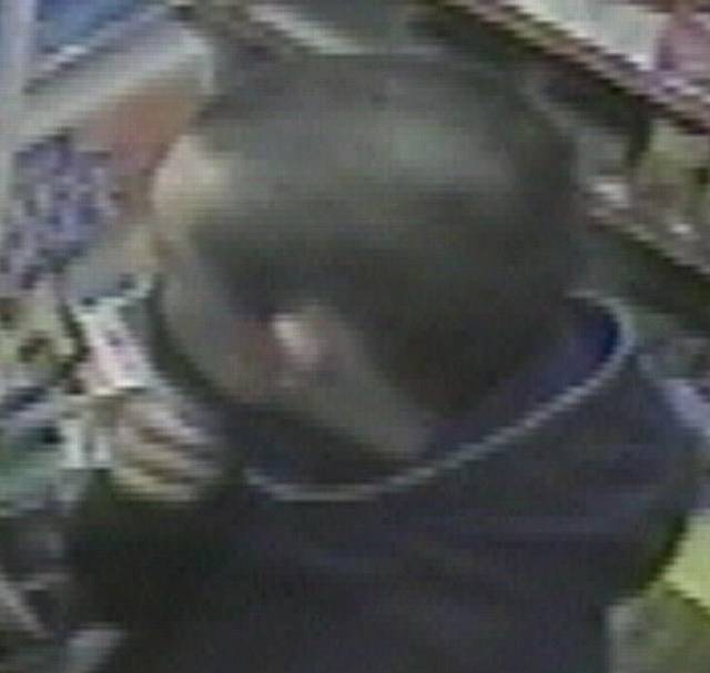 Close-up of the armed robber