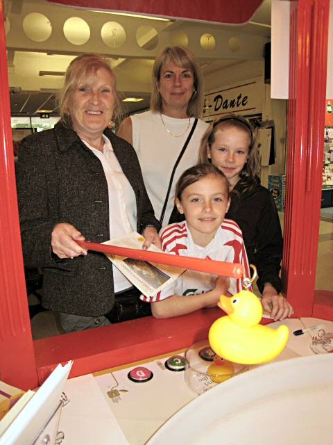 Mary Carter from Middleton, her two grandchildren Charley and Chloe May with Christine Buckley (Kingsway Office Manager)