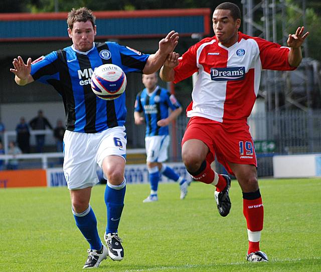 Ciaran Toner battles with Spence.