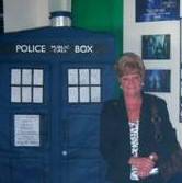 Councillor Ashworth alongside the Dr Who tardis.