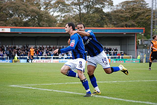 Dagnall wheels away with Simon Whaley after opening the scoring.