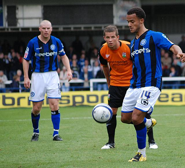 Whaley keeps possession deep in the Barnet half.