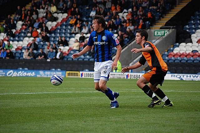 Will Buckley receives the ball with his back to goal in the Barnet penalty area.