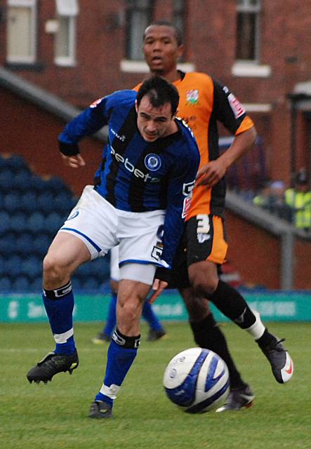 Dagnall tracks the ball down.