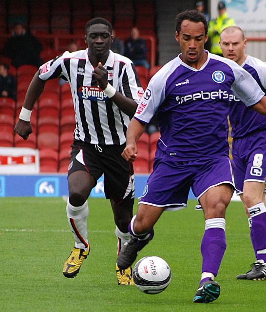 Chris O'Grady lays the ball off.