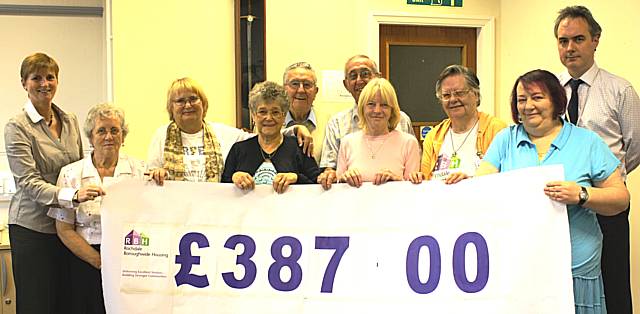 RBH Tenants present the cheque to Rose Tipton, Macmillan Cancer Care.