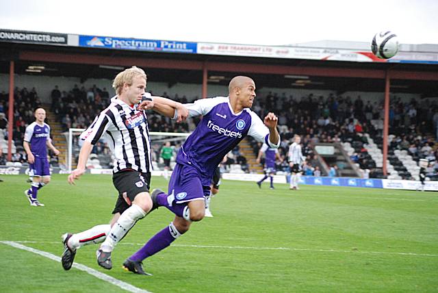 Joe Thompson beats his man into the Grimsby box to set up Dale's second goal.