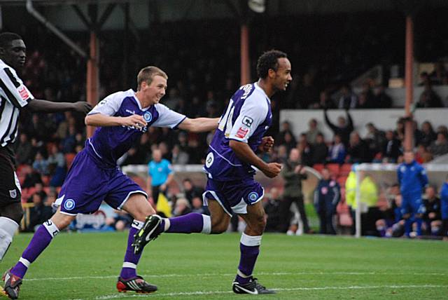 Chris O'Grady celebrates after making the points safe for his side.