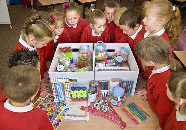 Primary school pupils from Bowlee Park Community Primary School select a reward.