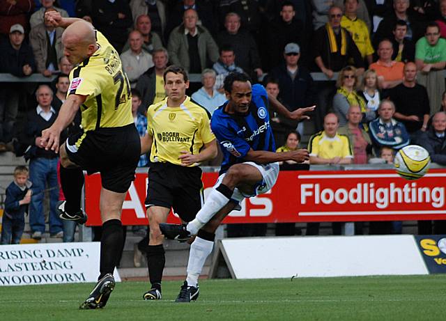 Chris O'Grady's shot cannons off former Dale defender Guy Branston.