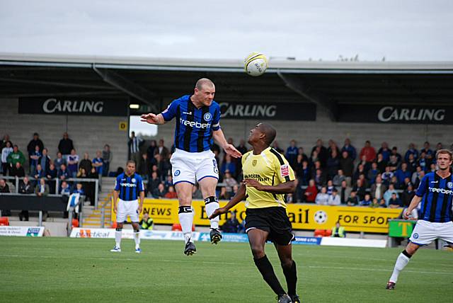 Jones wins a header.