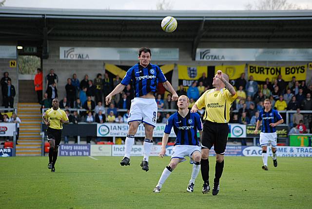 Dagnall wins a header.