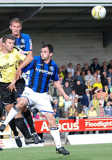 James heads clear under pressure from Dagnall and Craig Dawson.