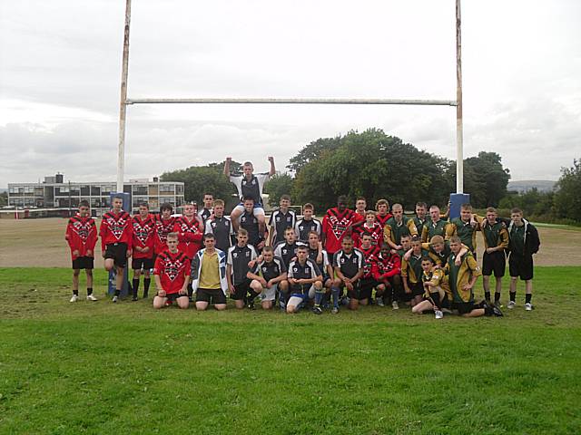 Year 11 teams Matthew Moss (blue), St Cuthbert's (Red) and Balderstone Technology College (Green) pictured at the end of the tournament.