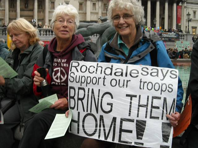 Peace Group members Rae Street and Pat Sanchez holding a placard in Trafalgar Square on Saturday 24 October 2009
