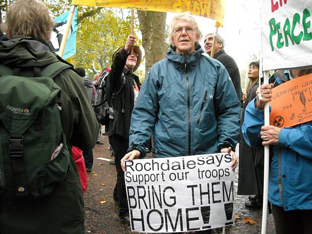 Peace Group member Philip Gilligan with a placard in Hyde Park on Saturday 24 October 2009

