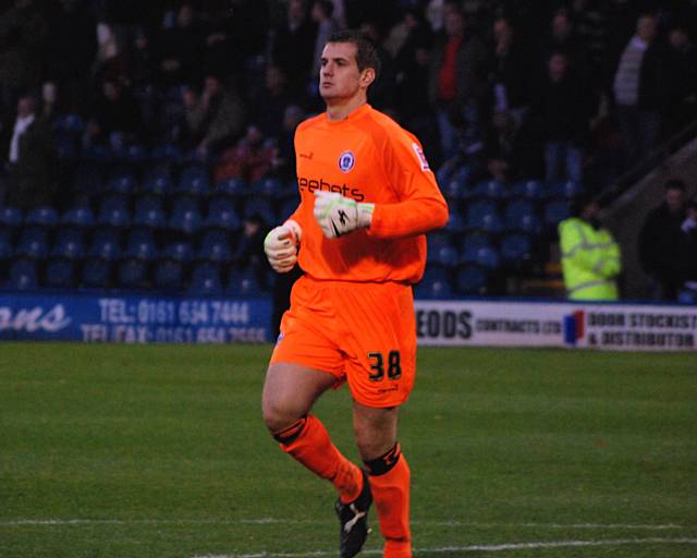 Loanee Tom Heaton warms up for the second half