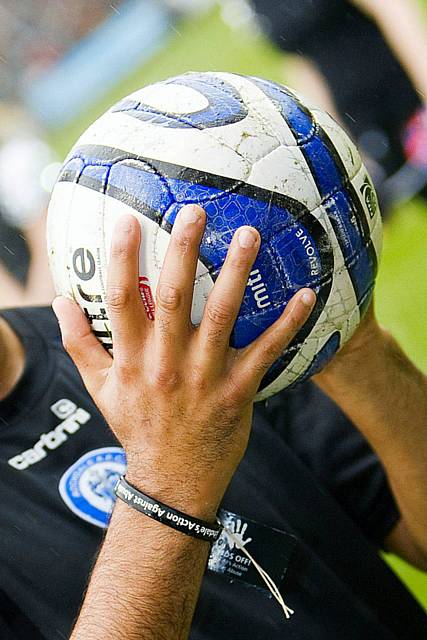 Players were wearing the Hands Off! wristbands to show their support for the campaign