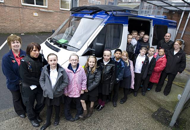 Pupils from Elmwood Primary School treated to a tour of Middleton police station. 
 
