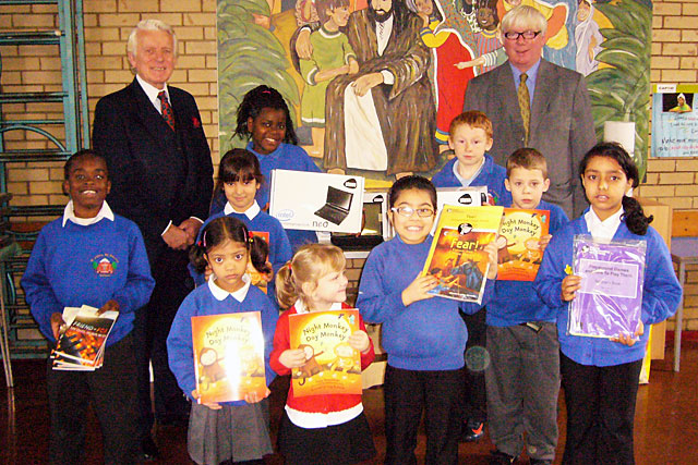 Mr John Lawson Wild from the institute of Chartered accountants and Paul Rowen MP with Saint John’s pupils