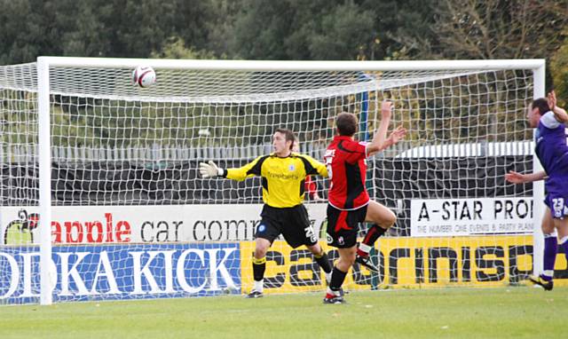 Jason Pearce heads into the net for Bournemouth but the goal was ruled out for offside.