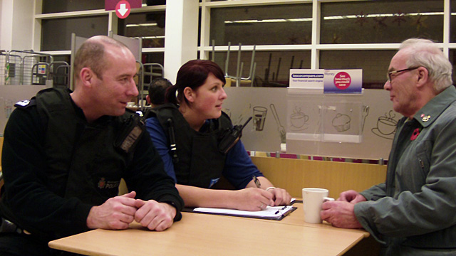 PC Fraser Douglas and PCSO Stephanie Kyle with a resident