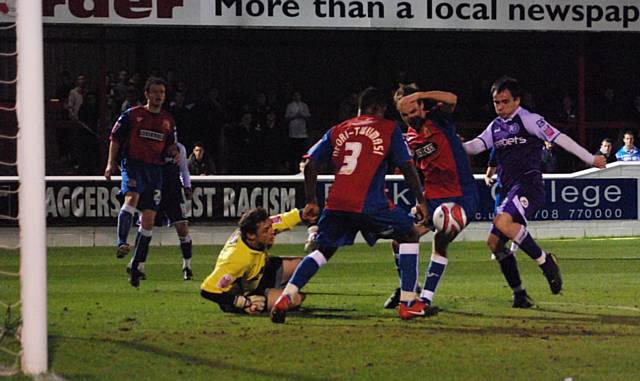 Dagnall comes close to a Dale leveller following a goalmouth scramble.