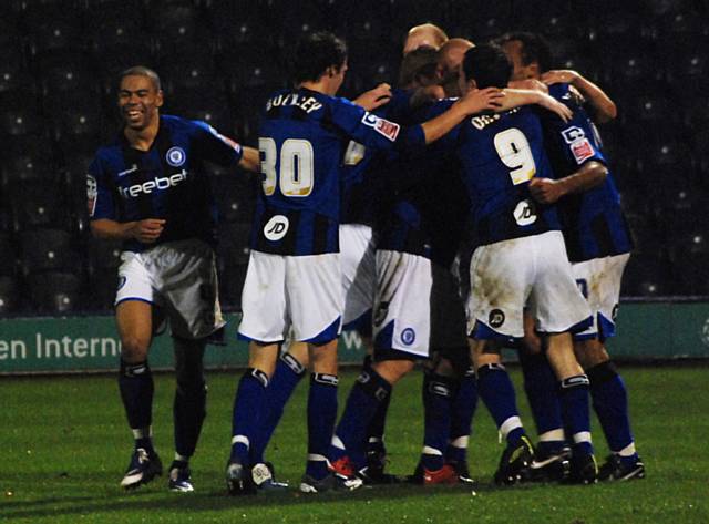 The rest of the Dale players join in the celebrations.