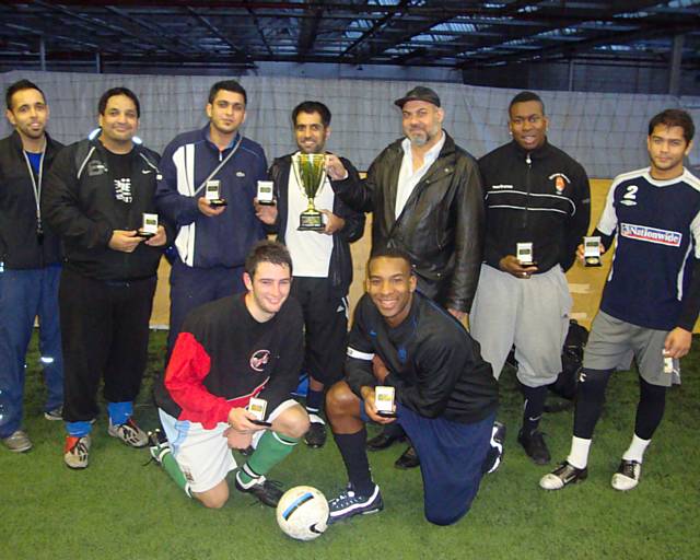 Bradford Allstars with the Golden Cup presented by Tahir Mahmood, president of the Golden Mosque