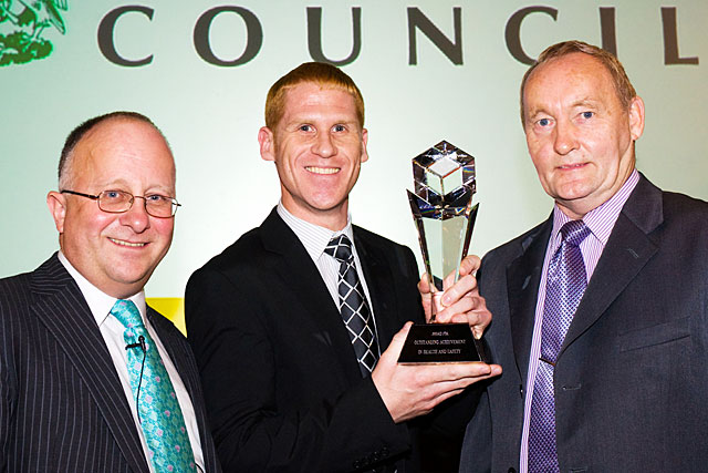 Richard Lord (centre) is presented with The Abdul Hamid Chowdry Award for Outstanding Achievement in Health and Safety by Chief Executive Roger Ellis (left) and Jack Brassington