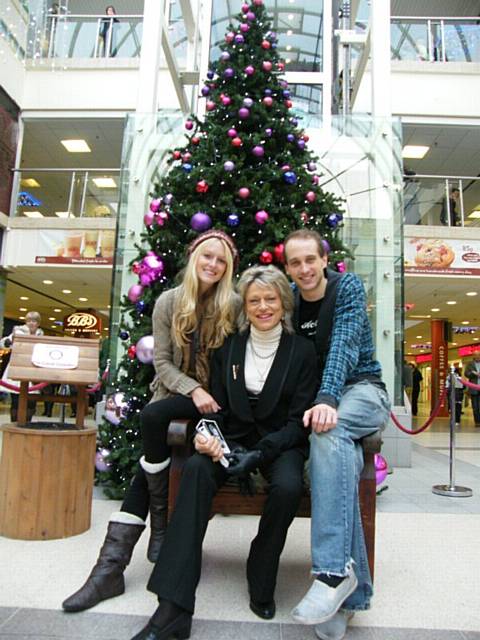 Waiting for Santa in Middleton Shopping Centre, Sleeping Beauty’s ‘Wicked Queen’ Nikki Kelly with ‘Princess Aurora’ Rachel Cole and ‘Muddles’ Fabian Hartwell.