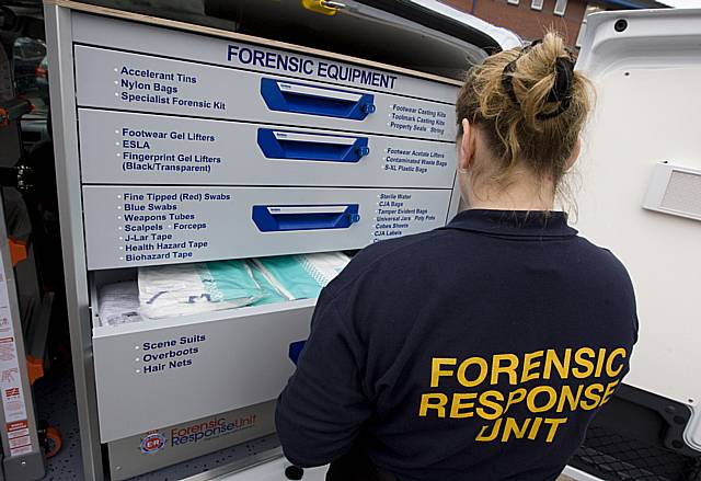 A Crime Scene Investigator from the recently launched Forensic Response Unit with one of their new customised response vehicles. 