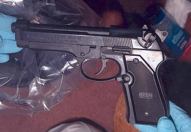 One of the handguns found at the gunman's home