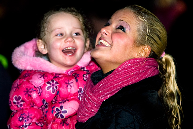 Olivia Shepherd (3) enjoys the firework display with mum Gemma