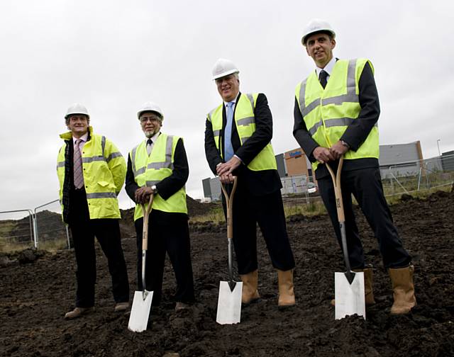 Robert Grafton, Cllr Mohammed Sharif, Stephen Boocock and David Beckett prepare to cut the first sod at CR Laurence's new European HQ at Kingsway.